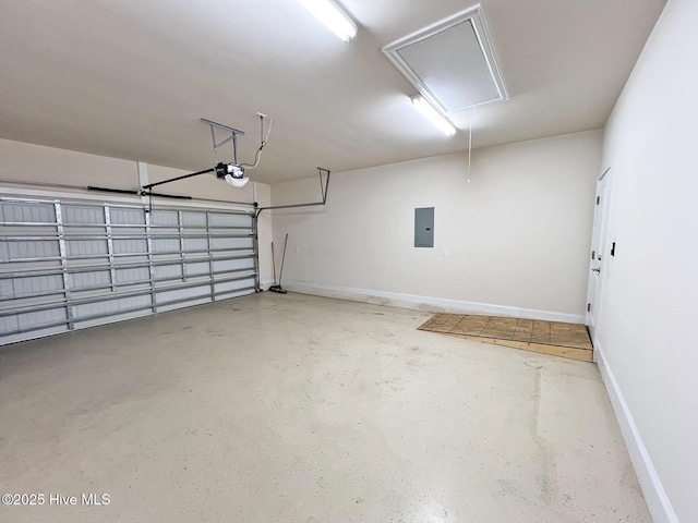 garage featuring electric panel, baseboards, and a garage door opener