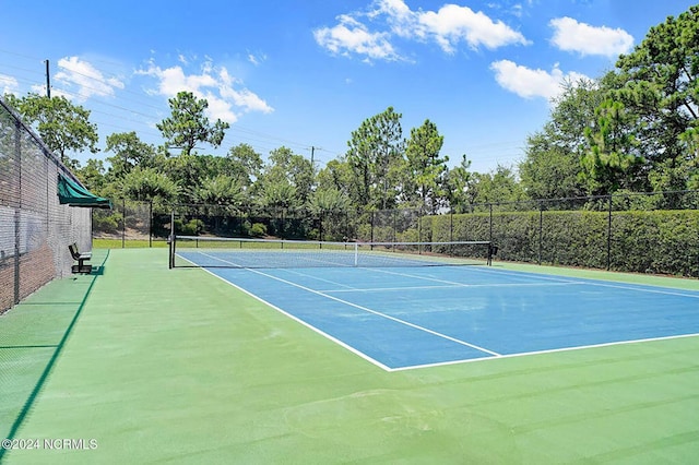 view of sport court with community basketball court and fence