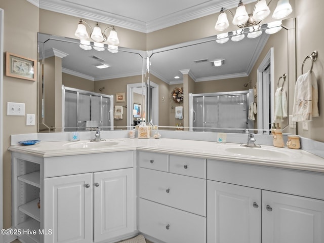 bathroom with a notable chandelier, visible vents, a sink, and a shower stall