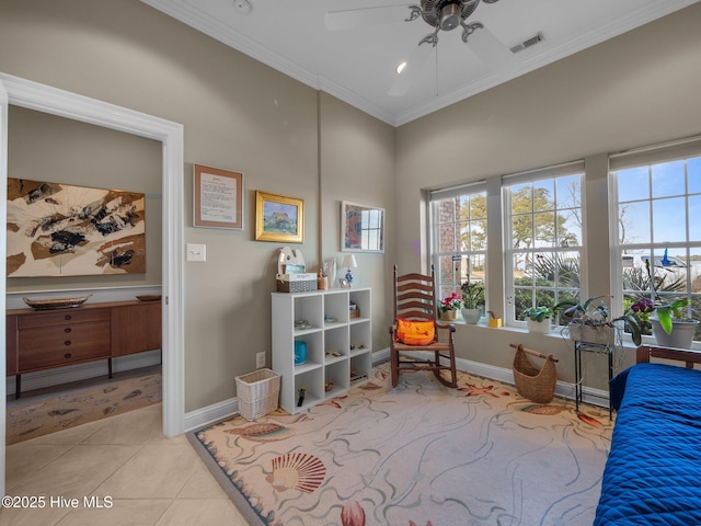 living area featuring baseboards, visible vents, ornamental molding, and tile patterned flooring