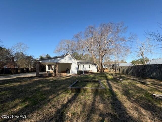 view of yard with fence