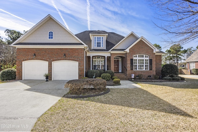 view of front of property with an attached garage, brick siding, driveway, roof with shingles, and a front lawn