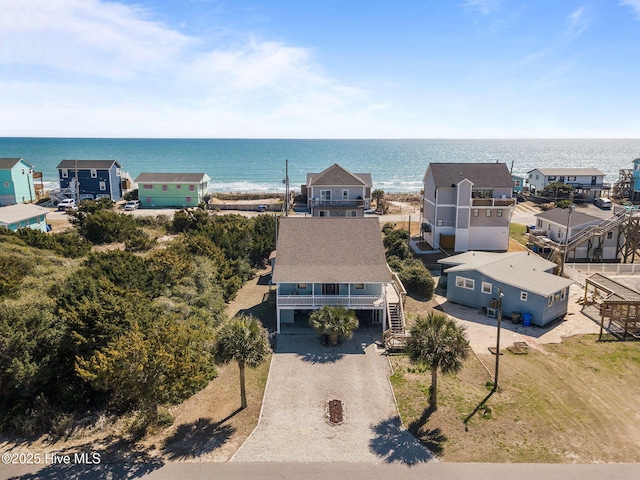 aerial view with a water view and a residential view