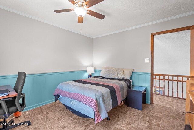 interior details featuring a water view and wainscoting