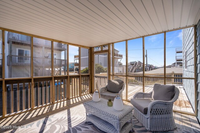 sunroom featuring a healthy amount of sunlight