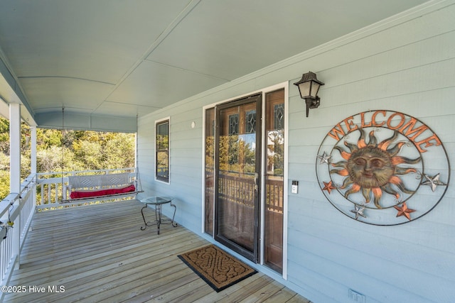 wooden deck with a porch