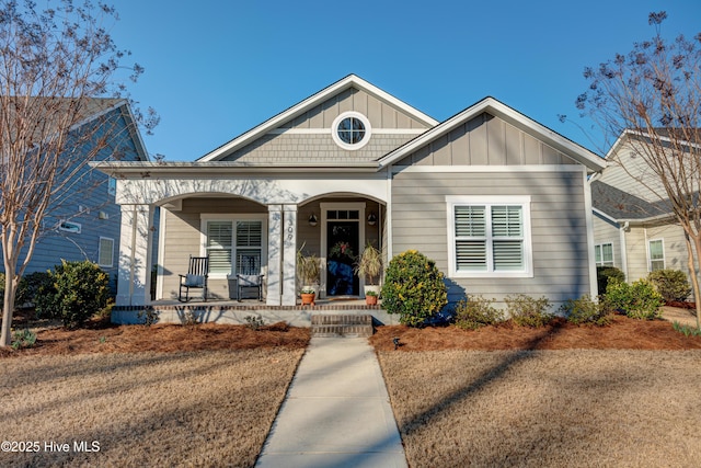 view of front of home with board and batten siding and a porch