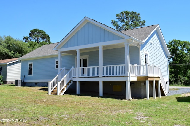 view of front of home featuring crawl space, central AC, a front lawn, and stairs