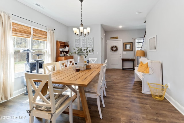 dining space featuring recessed lighting, visible vents, baseboards, dark wood finished floors, and an inviting chandelier