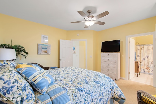 bedroom with light carpet and ceiling fan