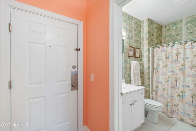 full bath featuring toilet, a shower with curtain, tile patterned flooring, and vanity