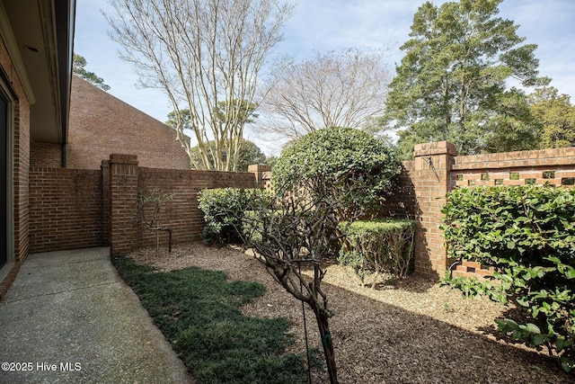 view of yard with fence