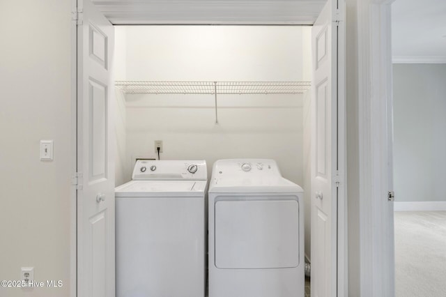 laundry room with carpet, laundry area, and washing machine and clothes dryer