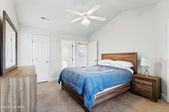 bedroom with baseboards, visible vents, ceiling fan, vaulted ceiling, and light carpet