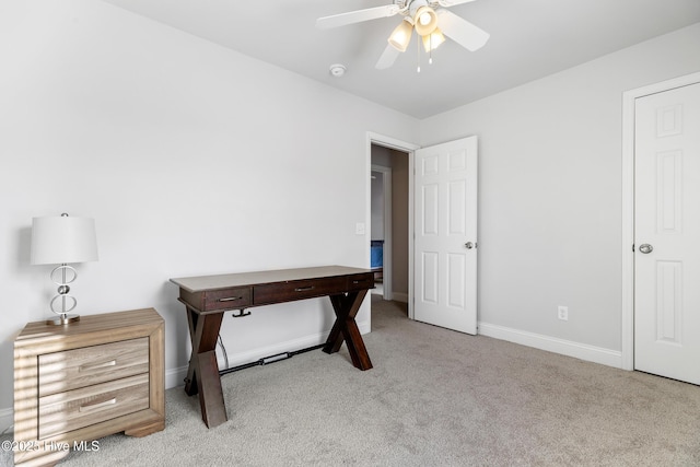 bedroom featuring a ceiling fan, carpet, and baseboards