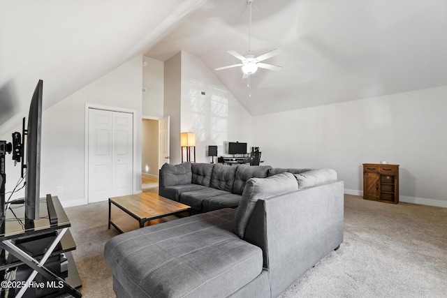 living room with high vaulted ceiling, a ceiling fan, baseboards, and light carpet