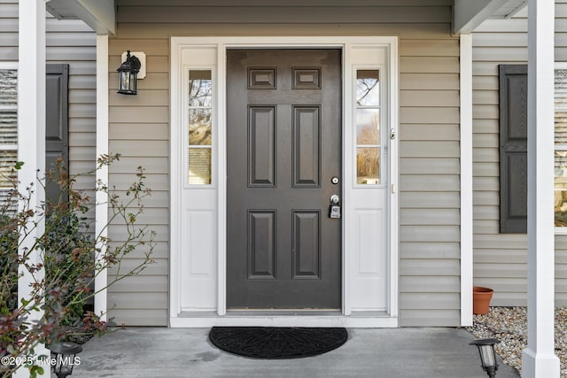 entrance to property with a porch