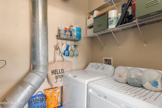 laundry area featuring laundry area and independent washer and dryer