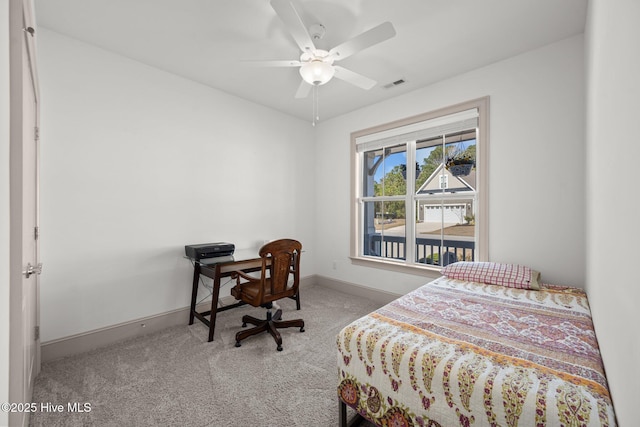 bedroom featuring visible vents, baseboards, carpet, and ceiling fan