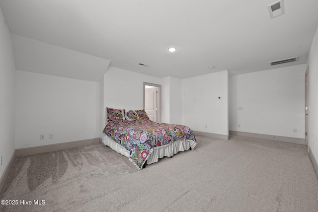 bedroom with carpet flooring, baseboards, and visible vents