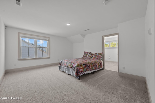 bedroom with visible vents, baseboards, and carpet