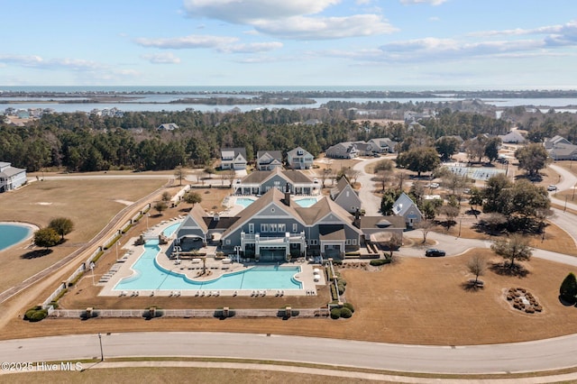 birds eye view of property featuring a water view