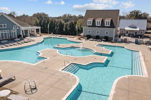 community pool featuring a patio area and a pergola