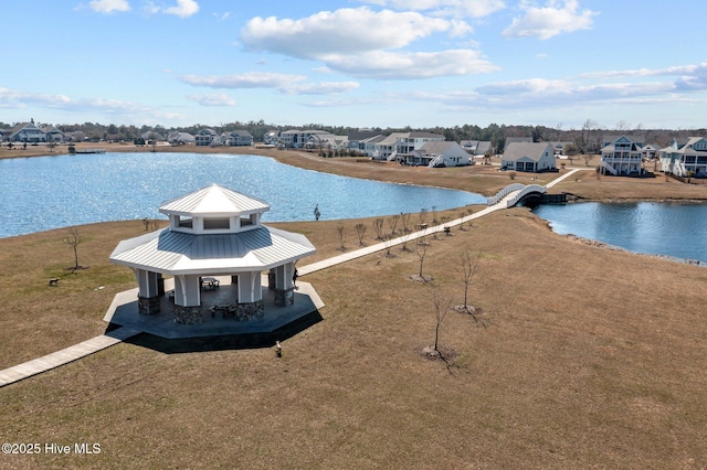 view of water feature featuring a gazebo and a residential view