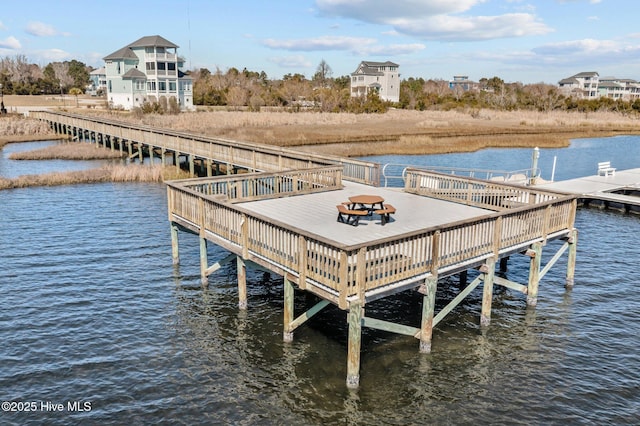 view of dock with a water view