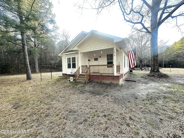 bungalow-style house featuring crawl space and a porch