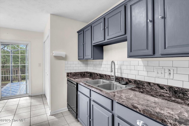 148 Mendover Dr, Jacksonville, NC 28546 - kitchen featuring black dishwasher, a sink, backsplash, light tile patterned flooring, and baseboards