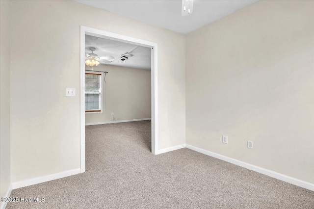 148 Mendover Dr, Jacksonville, NC 28546 - spare room featuring carpet flooring, a ceiling fan, and baseboards