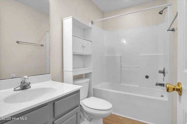 148 Mendover Dr, Jacksonville, NC 28546 - bathroom featuring toilet, vanity, washtub / shower combination, and wood finished floors