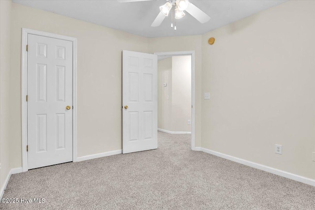 148 Mendover Dr, Jacksonville, NC 28546 - unfurnished bedroom with carpet, baseboards, and a ceiling fan