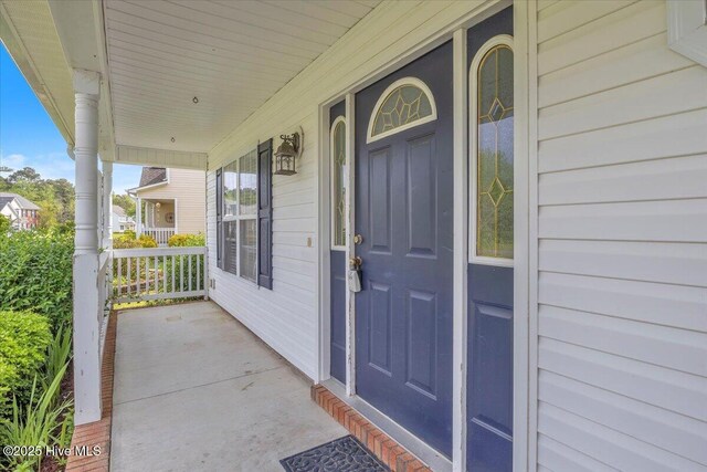 148 Mendover Dr, Jacksonville, NC 28546 - doorway to property with a porch