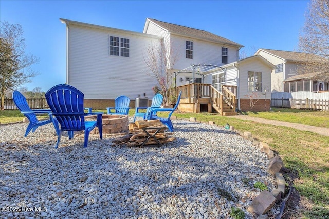 148 Mendover Dr, Jacksonville, NC 28546 - back of property with a fire pit and a deck