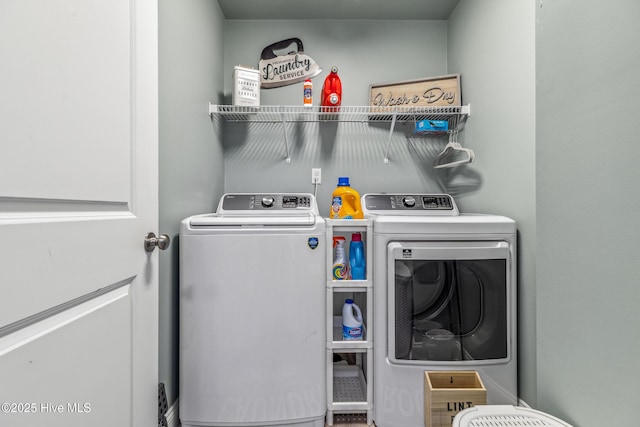 laundry area with laundry area and washing machine and dryer