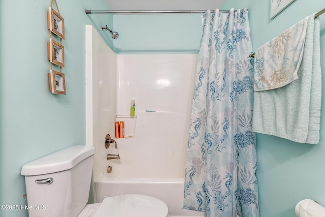 bathroom featuring toilet and shower / bathtub combination with curtain