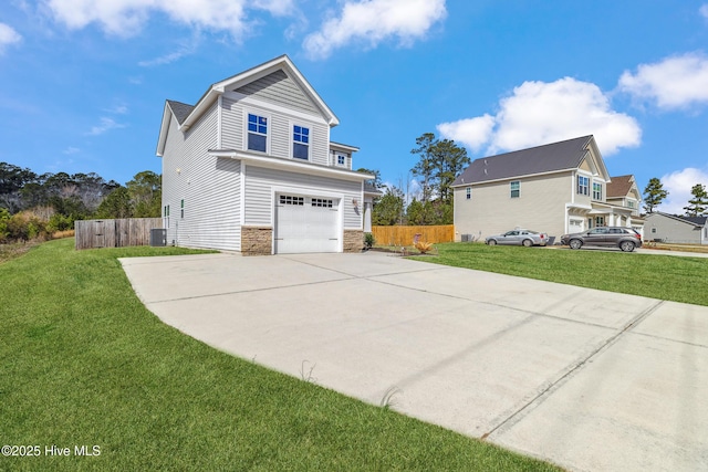 view of property exterior featuring stone siding, central AC, a yard, and concrete driveway