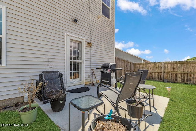 view of patio / terrace featuring fence and area for grilling