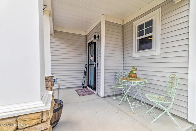 doorway to property featuring covered porch