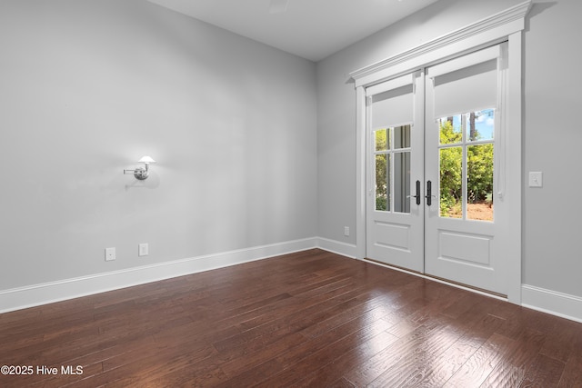2900 Legends Dr, Southport, NC 28461 - foyer featuring french doors, hardwood / wood-style floors, and baseboards