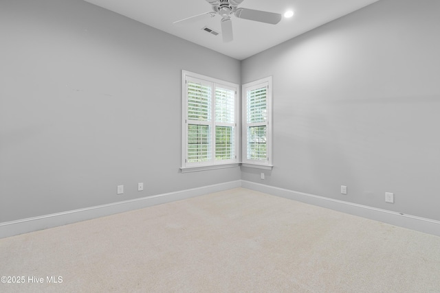 2900 Legends Dr, Southport, NC 28461 - spare room with carpet flooring, ceiling fan, baseboards, and recessed lighting