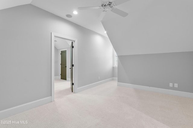 2900 Legends Dr, Southport, NC 28461 - bonus room featuring lofted ceiling, a ceiling fan, light colored carpet, recessed lighting, and baseboards