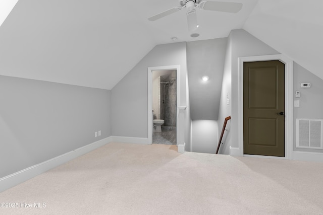 2900 Legends Dr, Southport, NC 28461 - additional living space with carpet floors, vaulted ceiling, baseboards, and ceiling fan