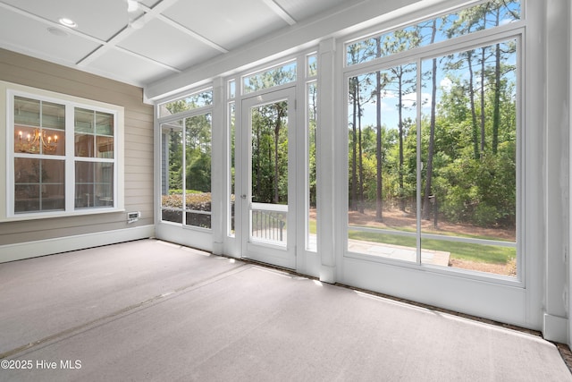 2900 Legends Dr, Southport, NC 28461 - unfurnished sunroom featuring a chandelier
