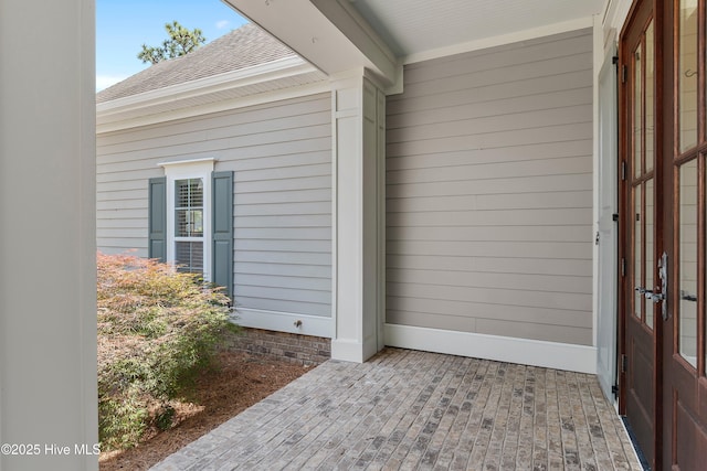 2900 Legends Dr, Southport, NC 28461 - entrance to property with roof with shingles