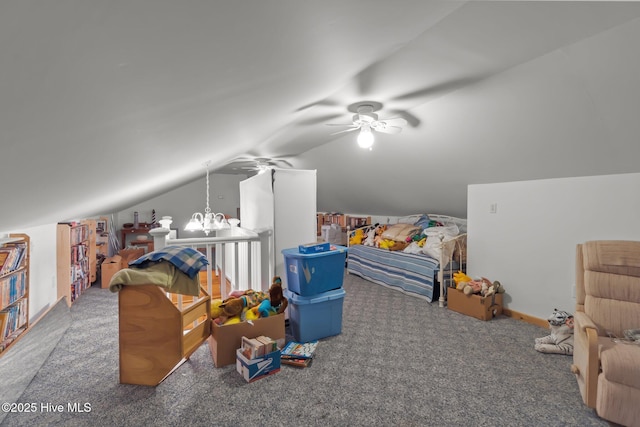 additional living space with baseboards, lofted ceiling, ceiling fan, and carpet flooring