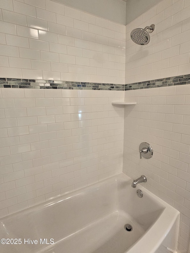 full bathroom featuring  shower combination