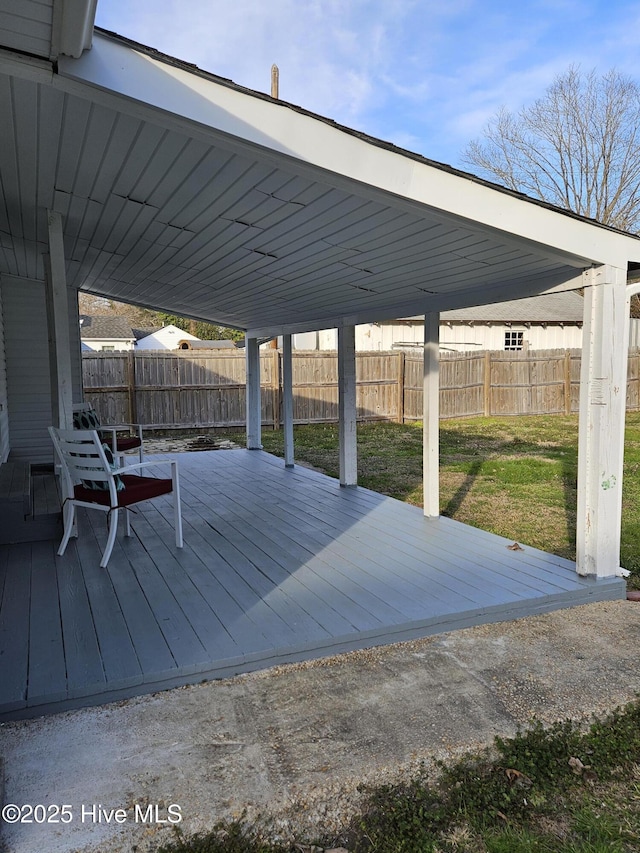 deck with fence and a yard